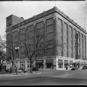 A black and white image of the Sears, Roebuck and Company building on the corner of Farman Street and Turner Blvd.